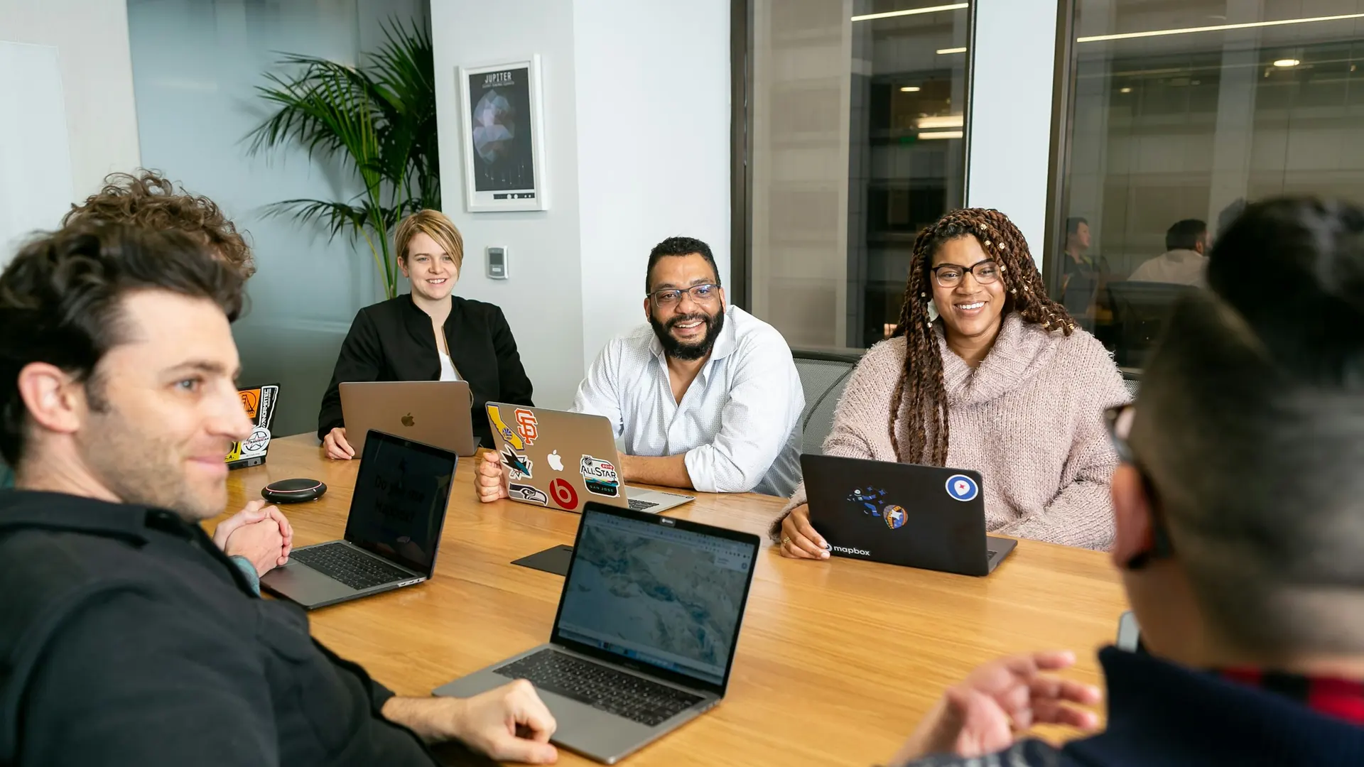 Professional services team in a meeting around a table